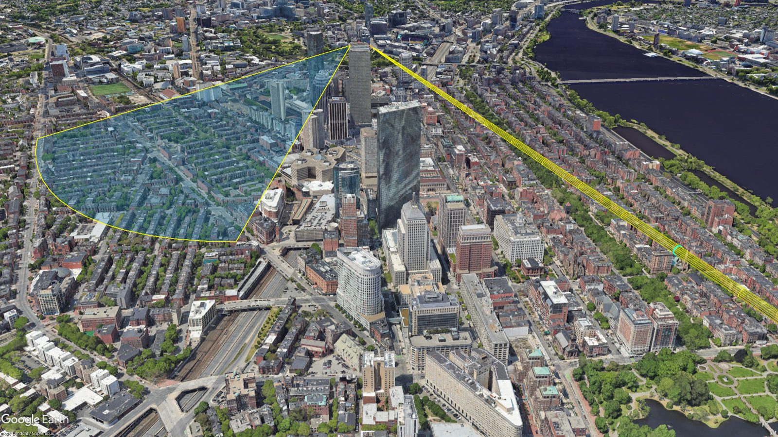 A blue down-tilted antenna sector and a yellow point-to-point Fresnel tube over Boston, viewed in Google Earth